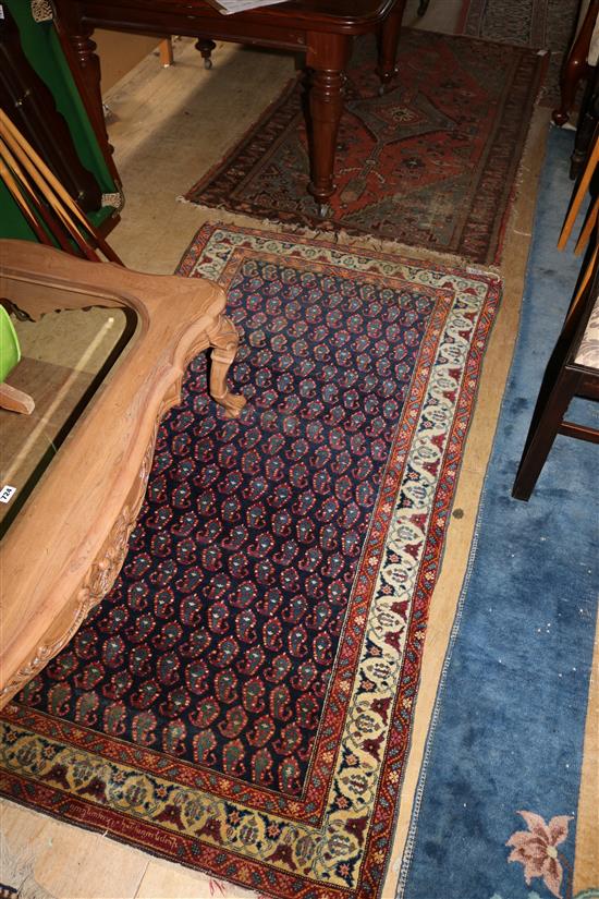 Red, blue & cream pattern rug & another